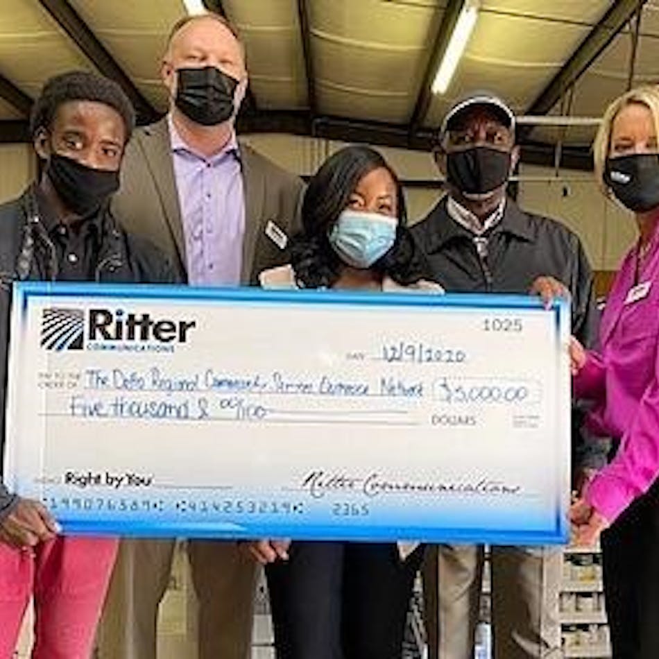 Representatives from The Delta Regional Community Services Outreach Network accept a $5,000 donation from Ritter Communications Director of Sales Josh Bradley (second from left) and sales representative Michele Watson (far right).
