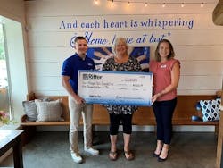 Colleen Nick of the Morgan Nick Foundation accepts a $5,000 donation from Ritter Communications Marketing Coordinator Melissa Cole (far left).